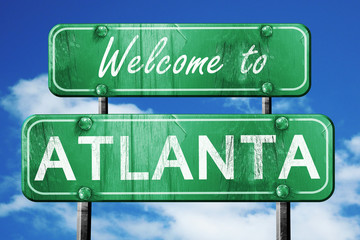 atlanta vintage green road sign with blue sky background