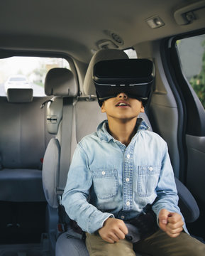 Boy using virtual reality goggles 