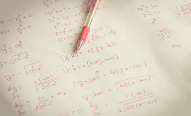 red pen on advanced mathematics (maths) in vintage style