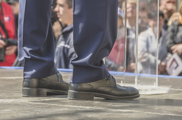 Leader at political rally in Usa with audience in the background