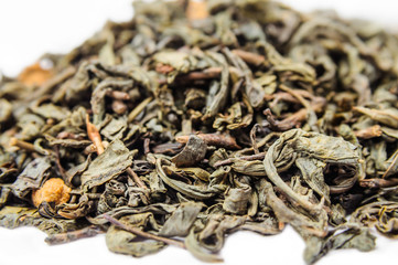 A bunch of dry green unpressed tea with flavors