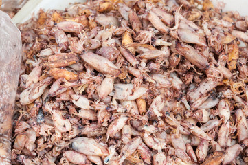 dried squid pile at market