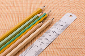 pencils and ruler on graph paper