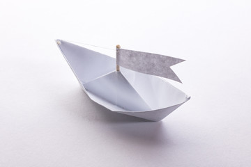 paper boat on a white background