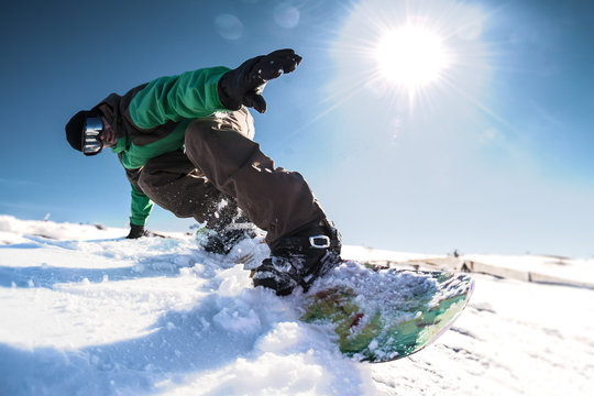 Snowboard freerider in the mountains