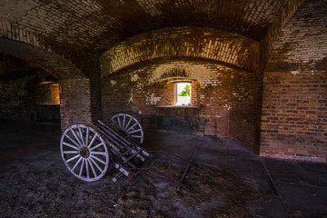 Standing on the moat which surrounds Fort Jefferson Civil War Fort and a prison for confederate soldiers