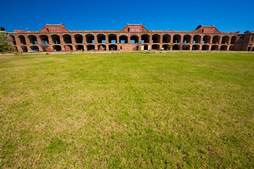 Standing on the moat which surrounds Fort Jefferson Civil War Fort and a prison for confederate soldiers