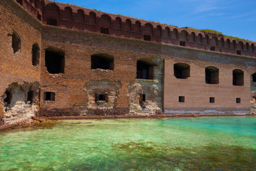 The crystal clear waters of the Gulf of Mexico surround Civil War Historic Fort Jefferson in the Dry Tortugas makes a great place for swimming and snorkeling