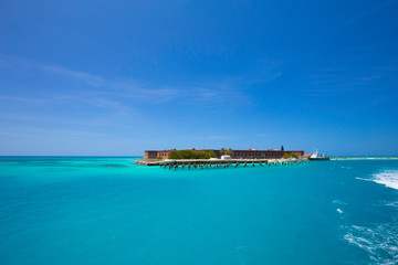 The crystal clear waters of the Gulf of Mexico surround Civil War Historic Fort Jefferson in the...