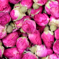 Dried rose flowers texture background closeup. Rose tea - dried rosebuds flowers texture closeup. Dry roses petals for Asian tea and spices. Copyspace for element or background.