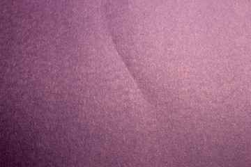 This is a photograph of textured Purple construction paper