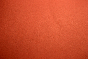 This is a photograph of a Bright Neon Orange construction paper background - obrazy, fototapety, plakaty