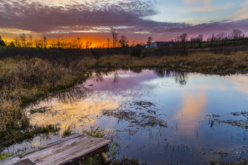 Fototapeta premium colorful rural sunset scene in late autumn