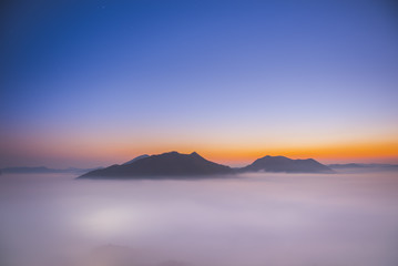 The skyline view and sunrise at mountain with lot of fog at Phu
