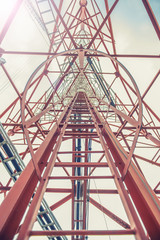 Telecommunication mast TV antennas with blue sky in the morning