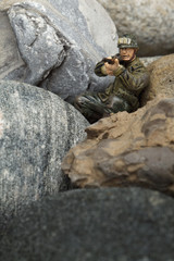  military soldier shooting an assault rifle