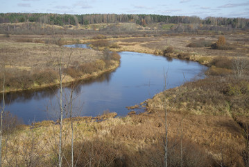 View of the bend of the river Sorot sunny october day. Pushkin mountains, Pskov region, Russia