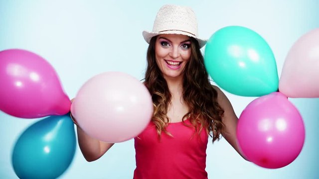 Woman summer joyful girl with colorful balloons 4K
