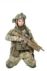 Portrait beautiful woman soldier or private military contractor with rifle