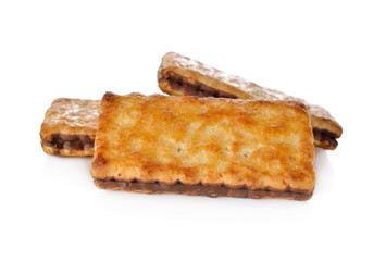 butter coconuts biscuits cocoa topped on white background