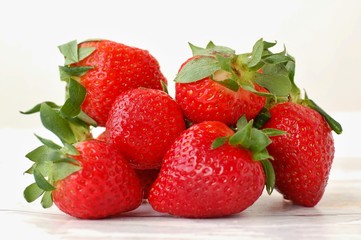 Strawberries on the wooden background