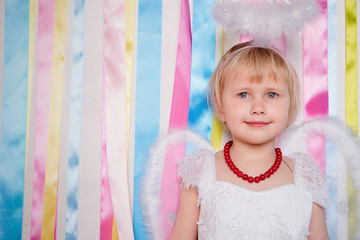 Portrait of beautiful princess girl in white dress with white ni