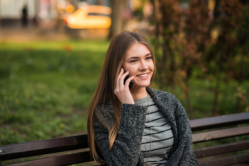 cute girl speaks by phone