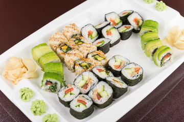 sushi rolls on white plate