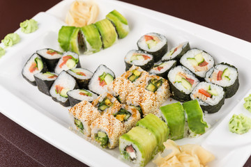 sushi rolls on white plate