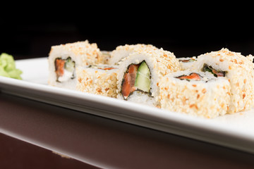 sushi rolls on white plate