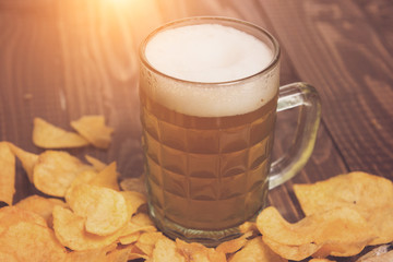 Frothy beer and crunchy chips