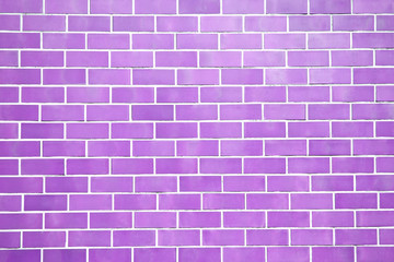 Fototapeta premium Purple new brick wall perfectly background. Best clean brick wall. Sweet and cute pastel color. Close up. Front view.