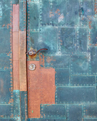 vintage rusty door closeup, metal background
