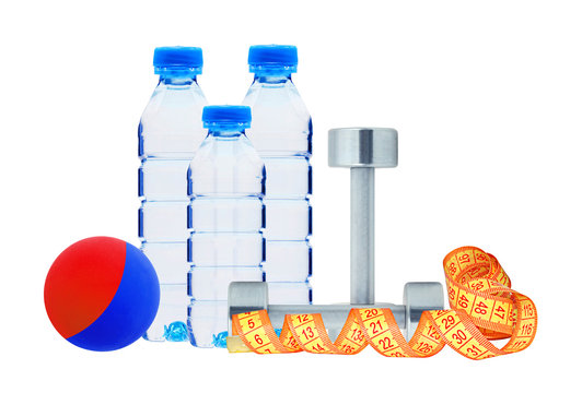 bottles of water, fitness dumbbells, ball and measure tape isola