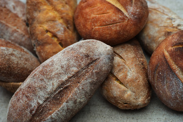 Loaves of Home Baked Leavened Bread made of wheat and buckwheat flour, raisins, tumeric using an antique recipe