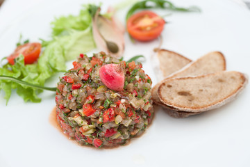 Closeup of Aubergine Pate served on a white plate
