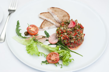 Closeup of Aubergine Pate served on a white plate