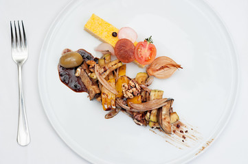 the Italian restaurant menu dish Caprese on the white plate