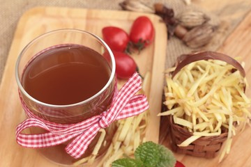 Ginger tea and fresh ginger.
