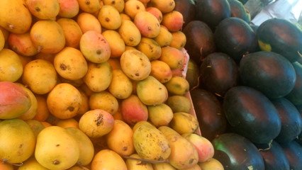 Naklejka na ściany i meble Full frame shot of mangoes for sale