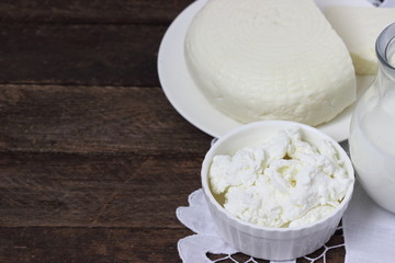 Dairy products on wooden table.