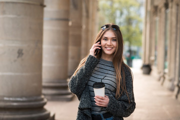 Fototapeta premium beautiful girl with coffee and tablet