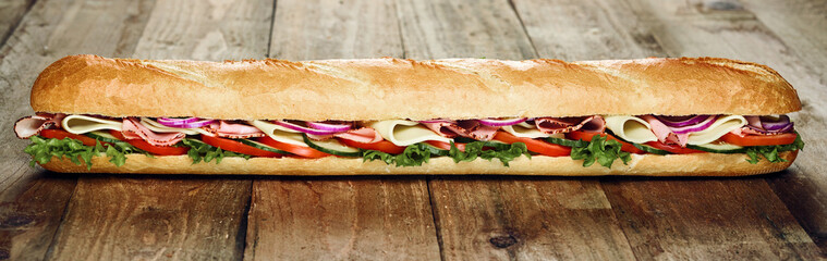 Delicious cold meat and salad French baguette - obrazy, fototapety, plakaty
