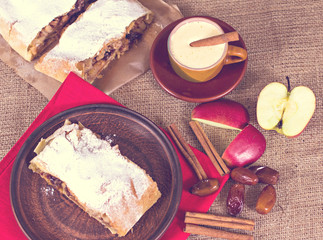 Apple strudel, apple pie, a cup of coffee  and heart. The atmosphere for a cozy romantic evening.