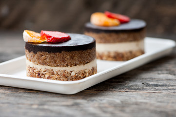 Raw vegan cake with chocolate on top