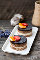 Raw vegan cake with chocolate on top