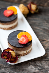 Raw vegan cake with chocolate on top