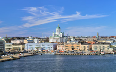 Helsinki, Finland. Scenic cityscape with Helsinki Cathedral, South Harbor, Market Square (Kauppatori) and beautiful cirrus clouds over them in the sunny spring day. - obrazy, fototapety, plakaty
