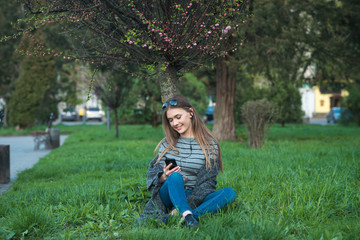 beautiful girl with coffee and smartphone