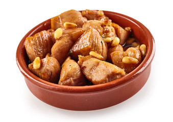 Spicy chicken pieces with pine nuts